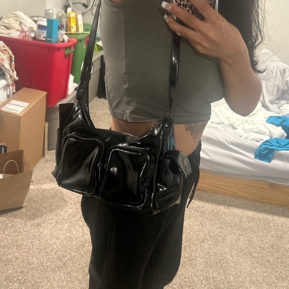 Urban Outfitters Handbags - Black Patent Shoulder Bag with Front Pockets
